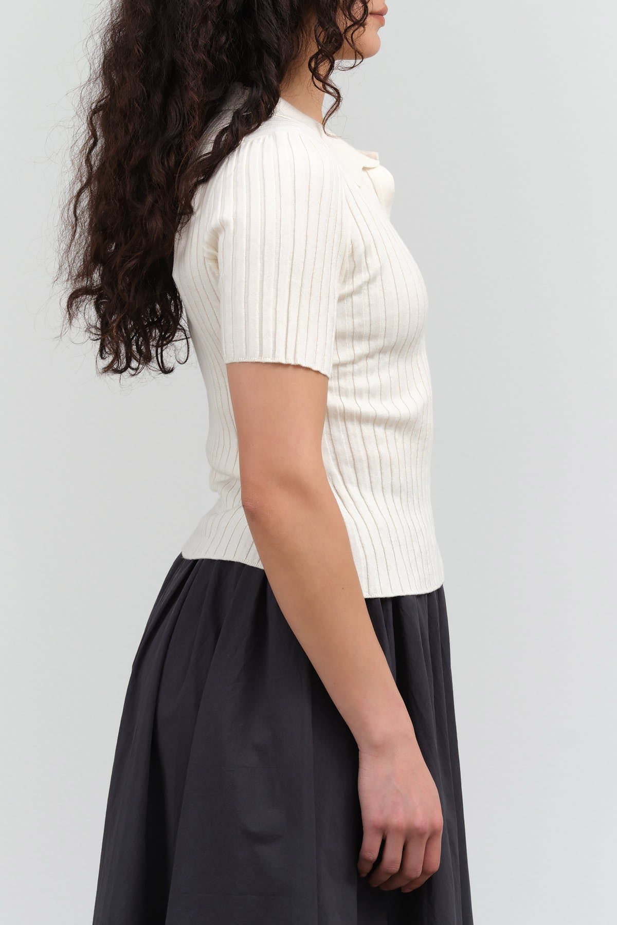 Side view of Collared V-Neck Knit Top in Off-White