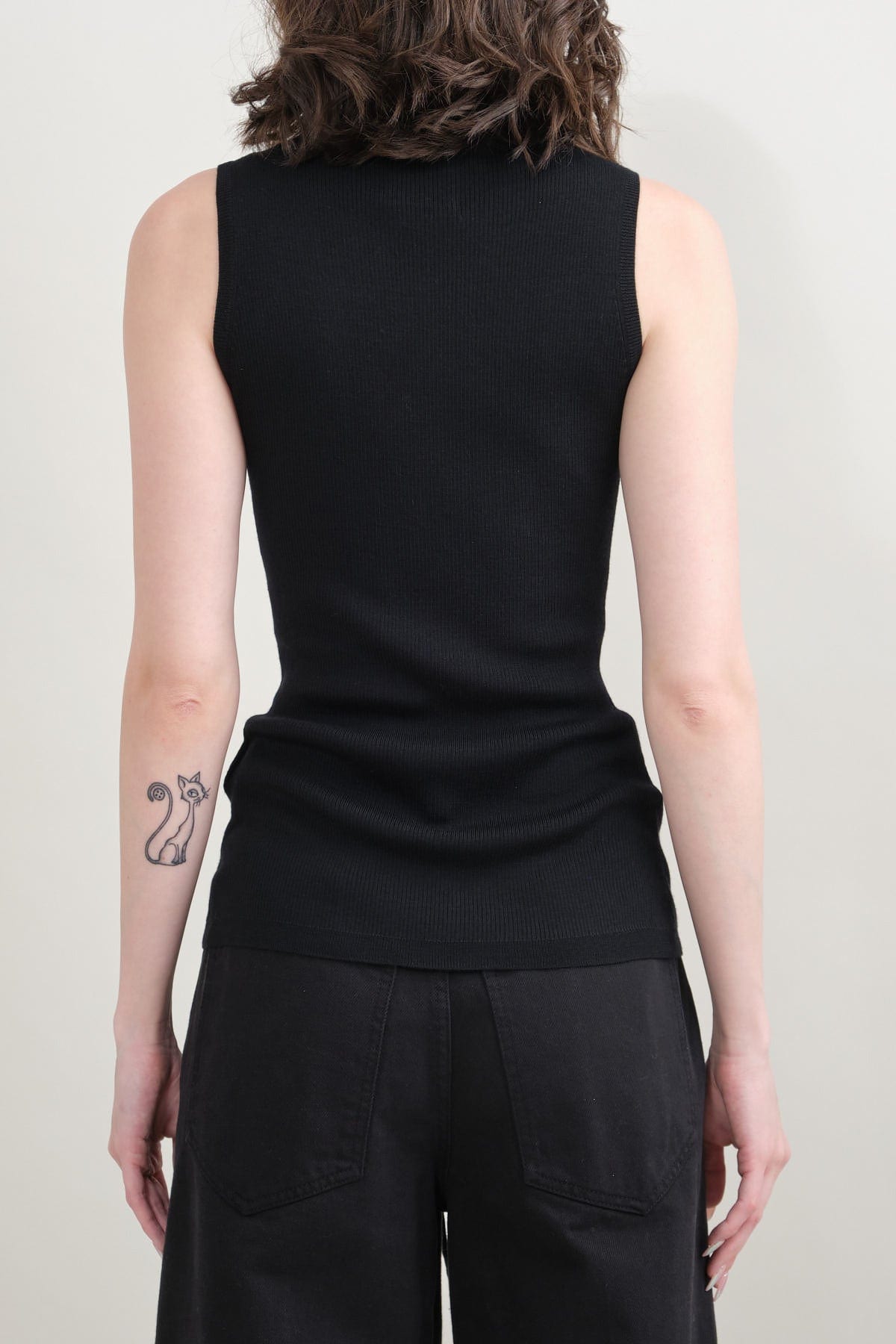 Back of Sleeveless Turtleneck Sweater