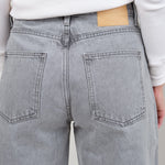 Back pocket on Leroy Mid Relaxed Bow Jean in Grey Stone Wash