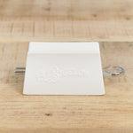 C.O. Bigelow Home Bath Accessories C.O. Bigelow Toothpaste Dispenser White / 3" L X 2" W  X 1.62" H