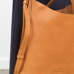 Close up strap view of Le Laudi Bucket Bag