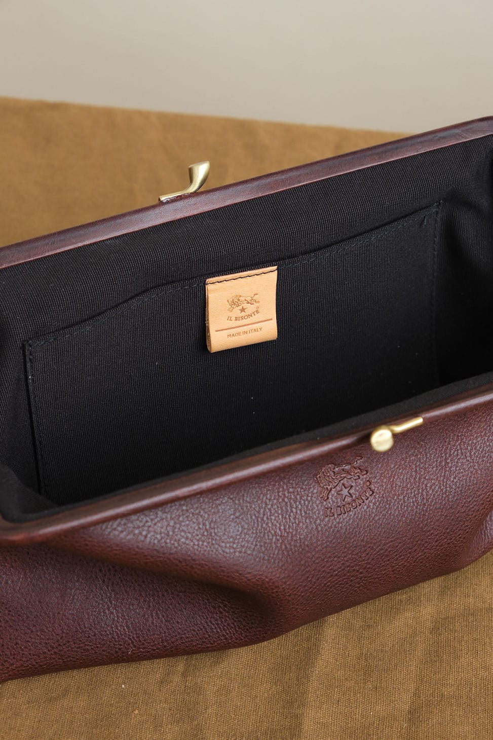 Inside of Manuela Classic Clutch Bag in Caffe