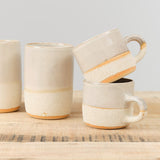 Kati Von Lehman Home CoffeeTea Stoneware Coffee Mug in Shino Shino / 3" H X 3.5" Dia