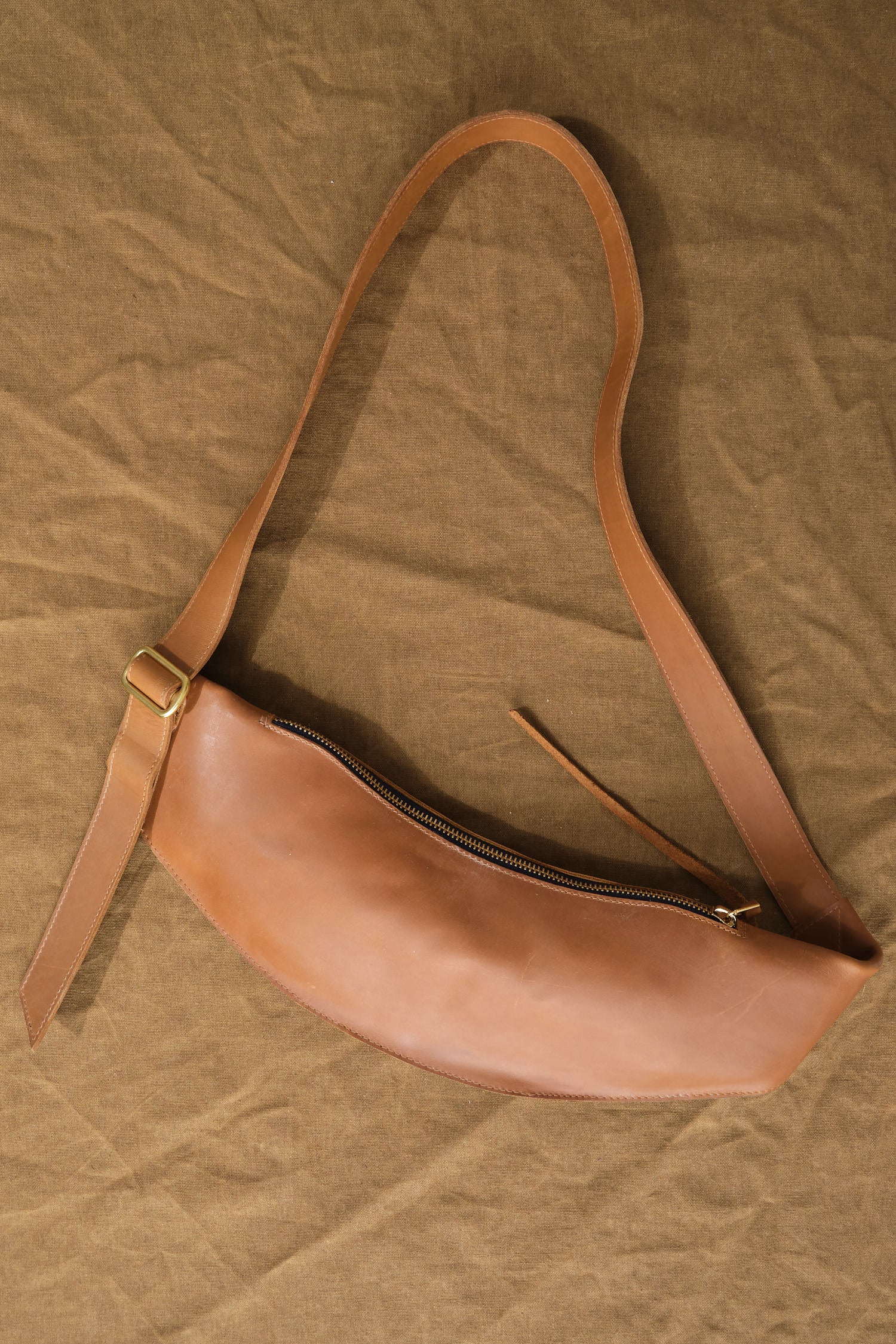 Sling Pouch by Kika NY in Tan