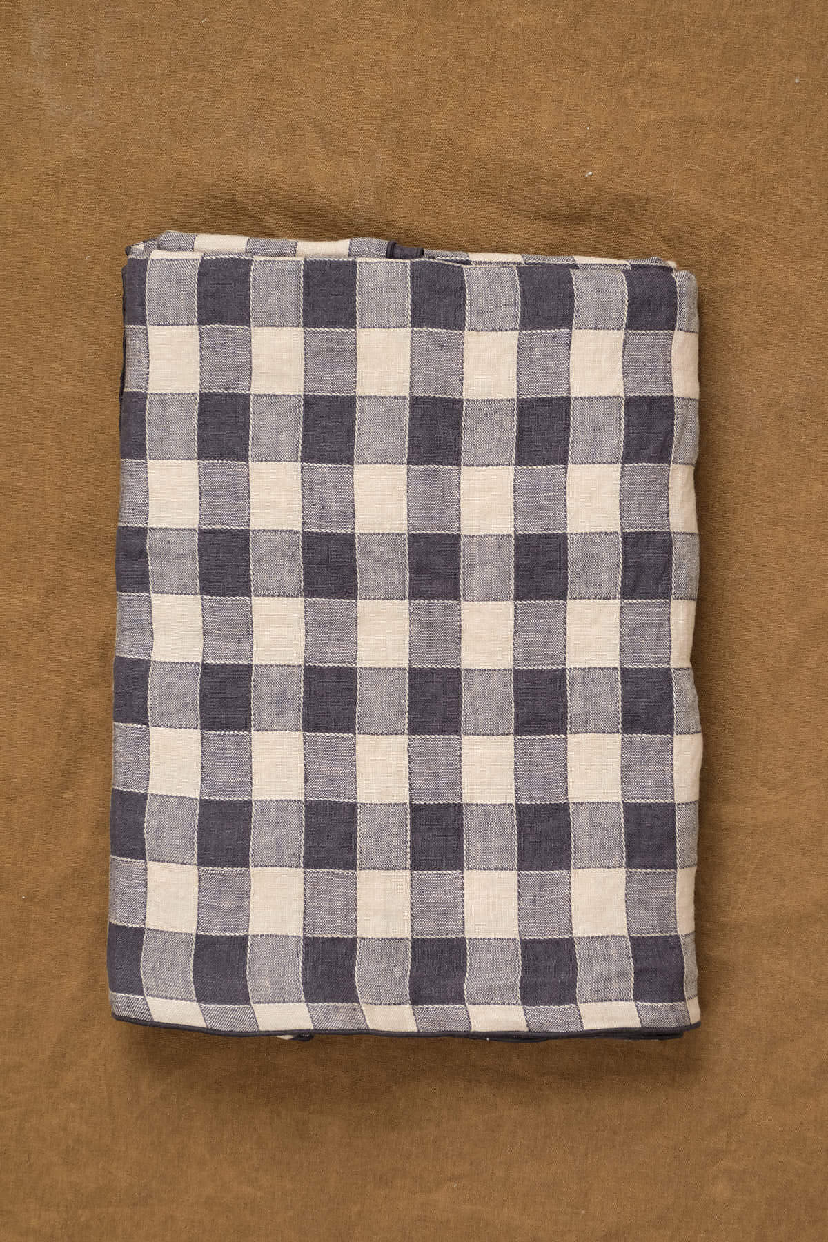 Folded view of Medium Canvas Vintage Vichy Tablecloth in Fusain