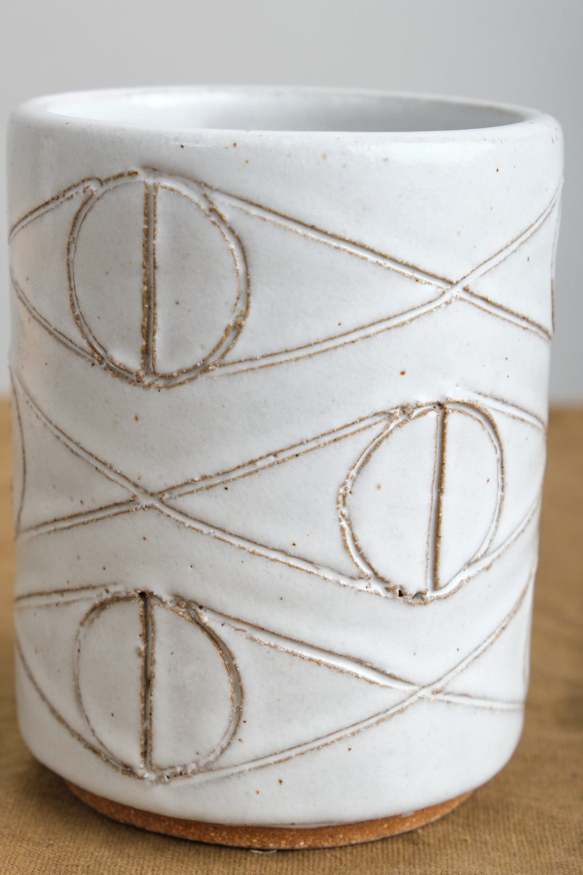 White Ceramic Tumbler with Evil eye design