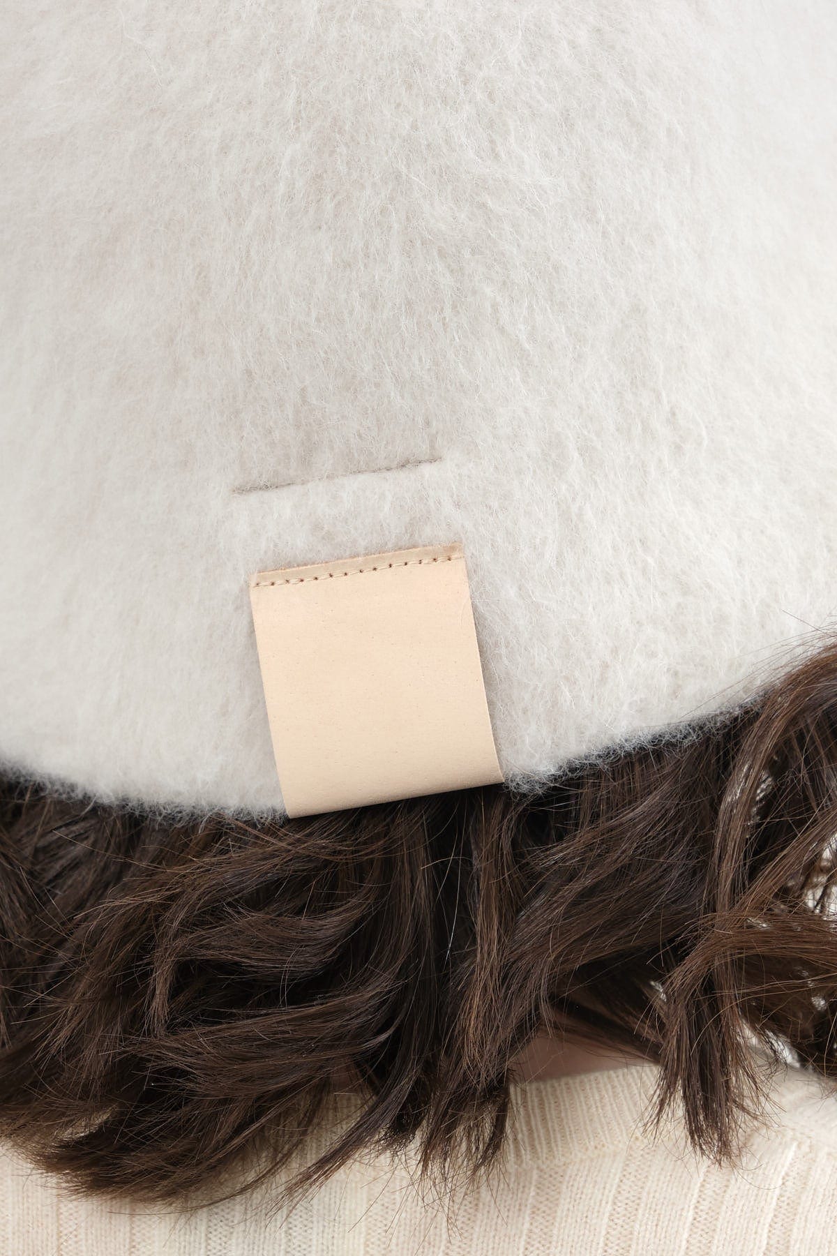 Leather tab on Bell Hat
