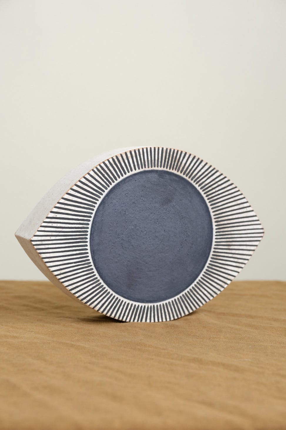 Medium Eye: New Eye Indigo on table