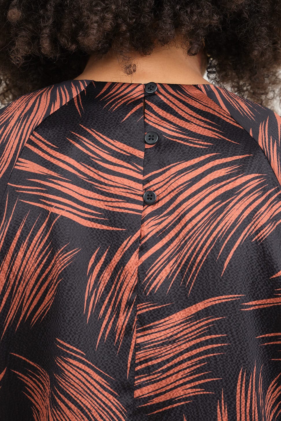 Back buttons on Maia Top
