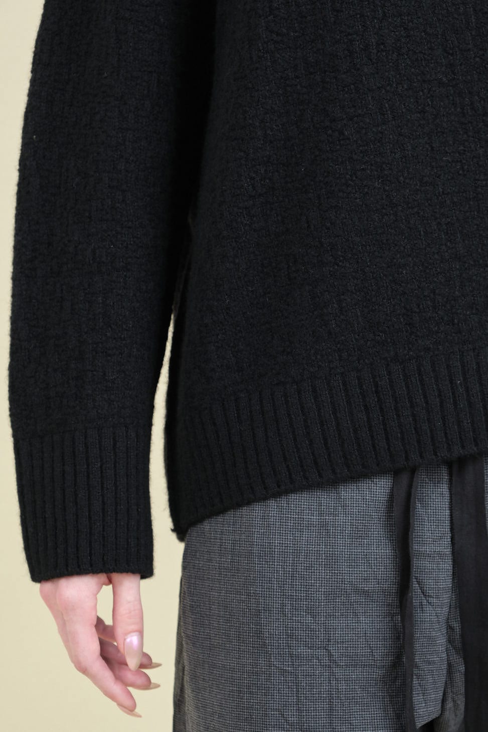 Hemline and cuff detailing
