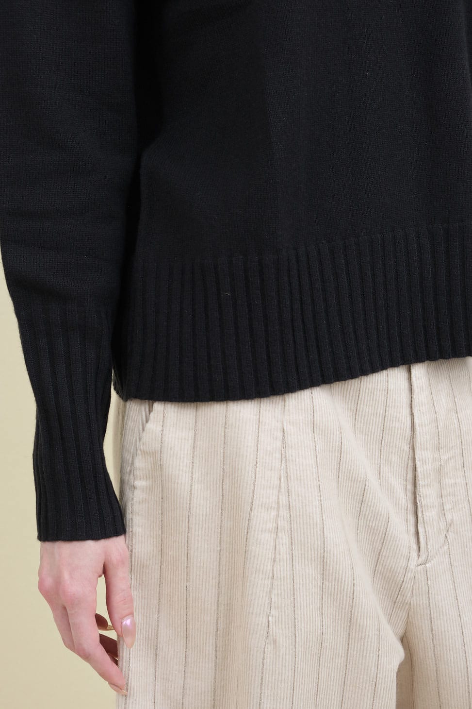 Hemline and sleeve on Baby Cashmere Crew in Black