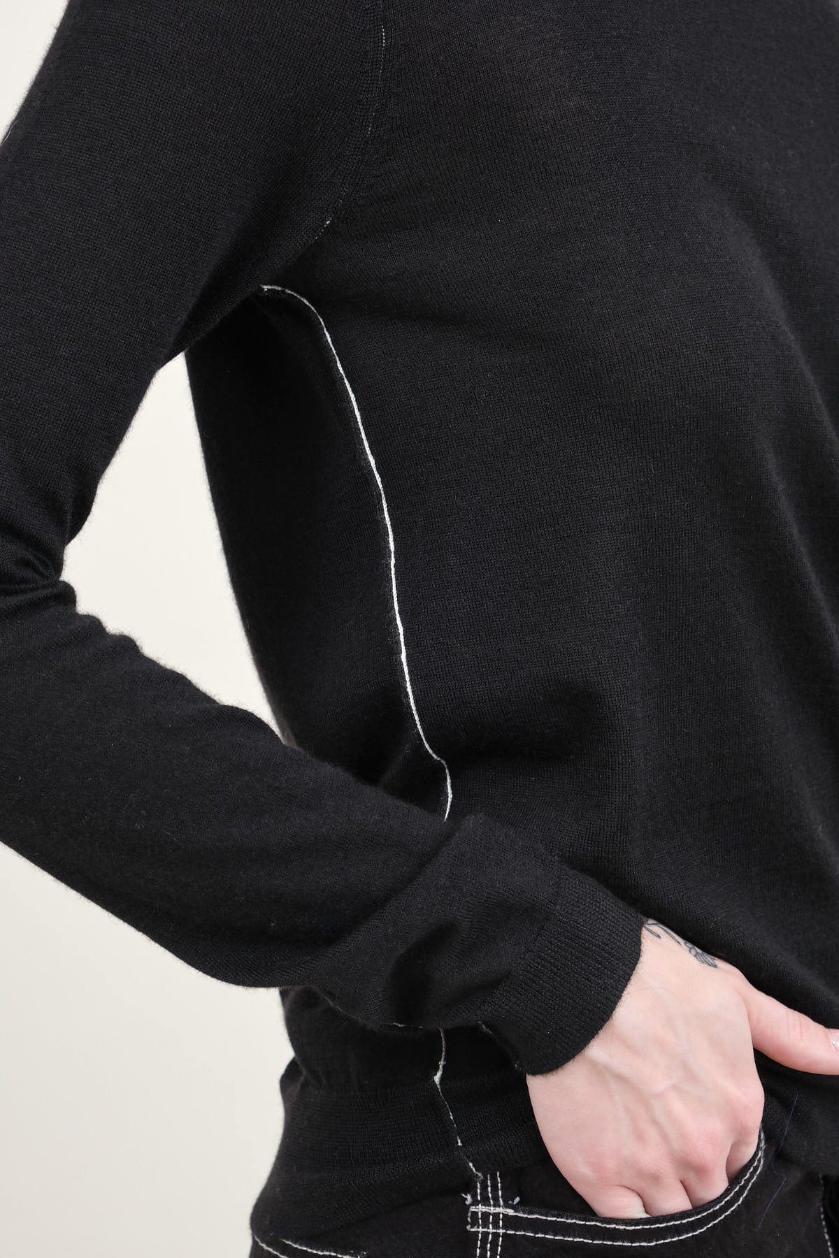 Exposed seam on L/S Crew in Black