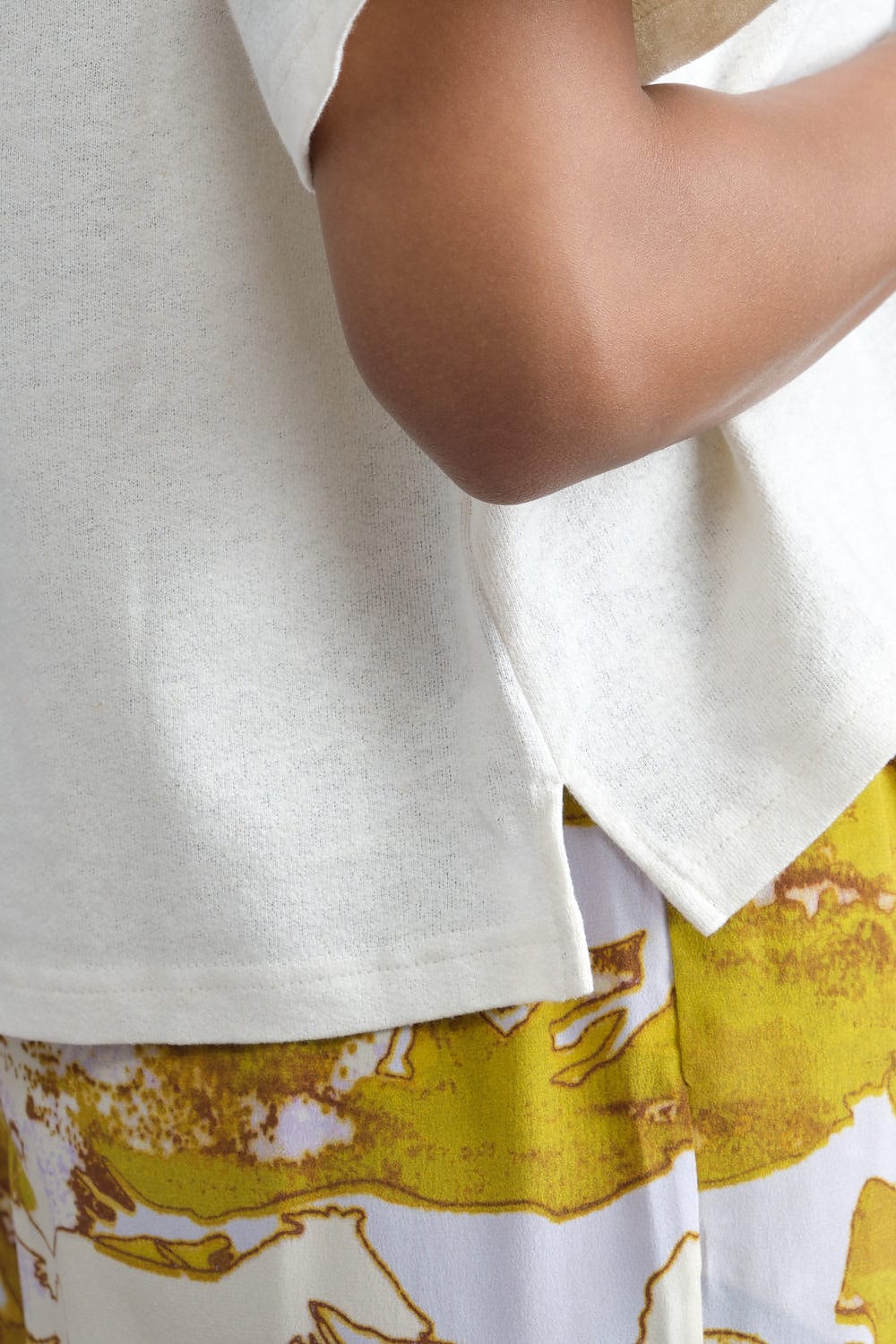 Side slit on Signature Cropped Tee in Off White