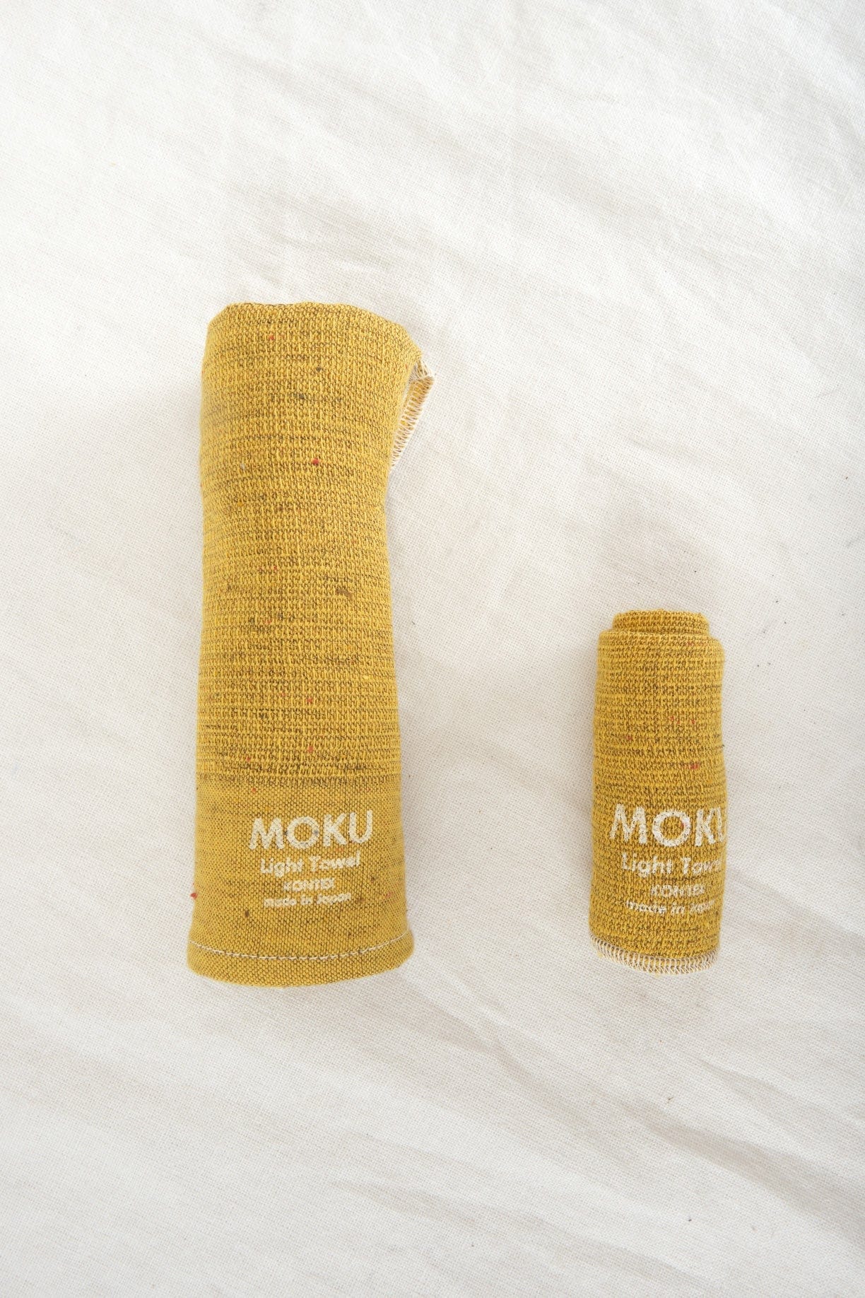 Kontex Home Bath Textiles Moku Light Hand Towel in Mustard Mustard / 42" L X 12.5" W