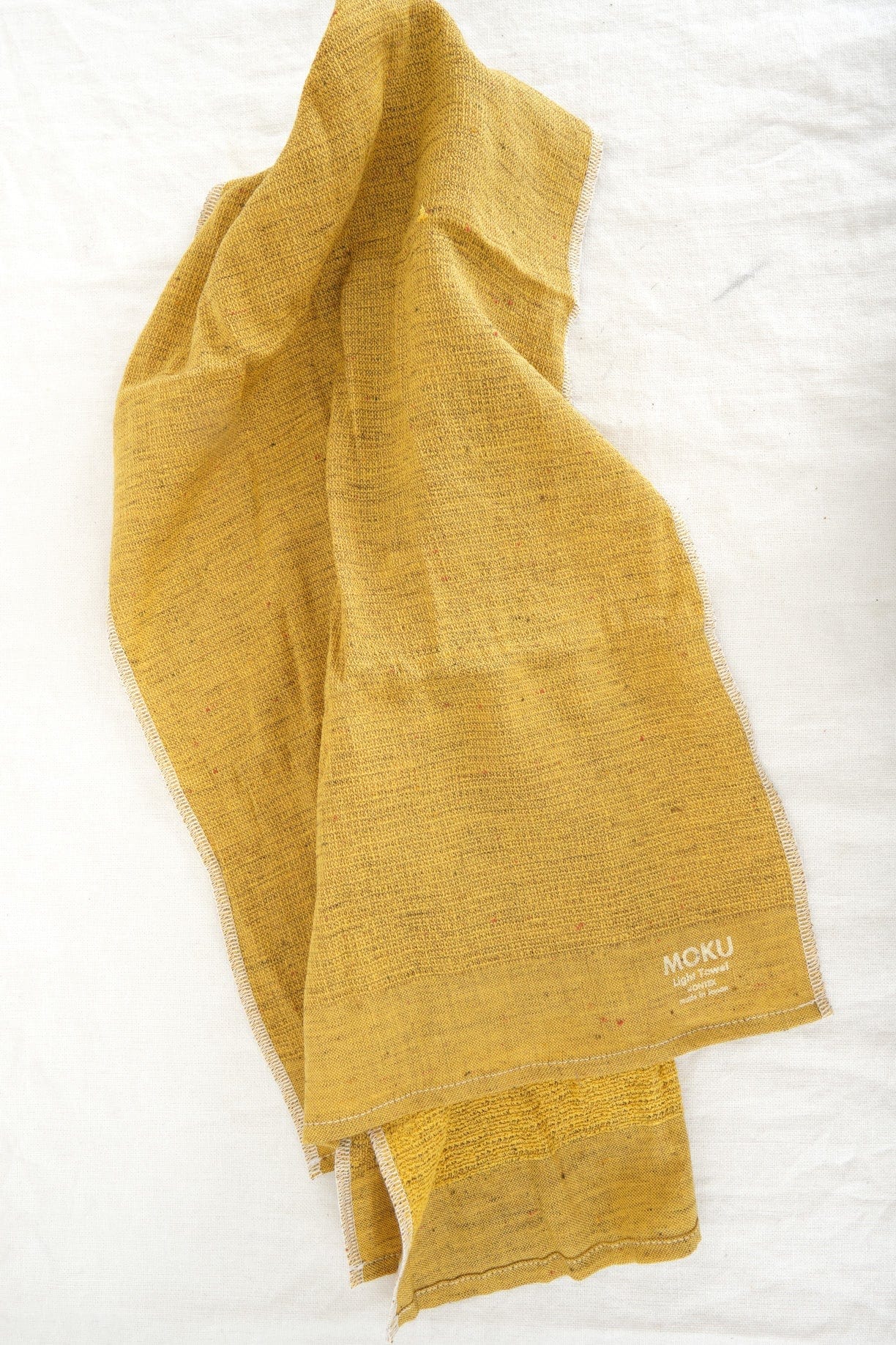 Kontex Home Bath Textiles Moku Light Hand Towel in Mustard Mustard / 42" L X 12.5" W
