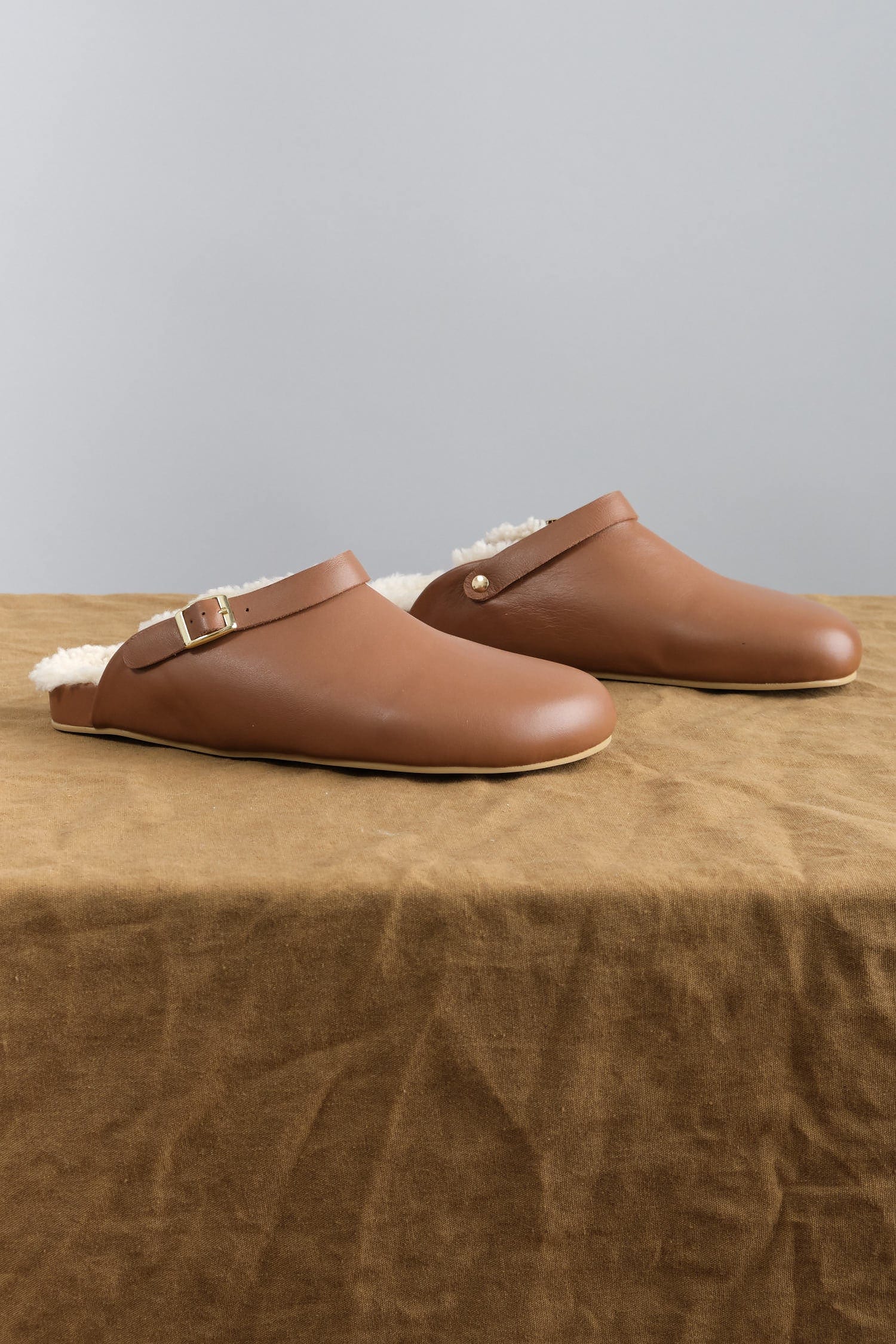 Clog with Shearling in Umber on table