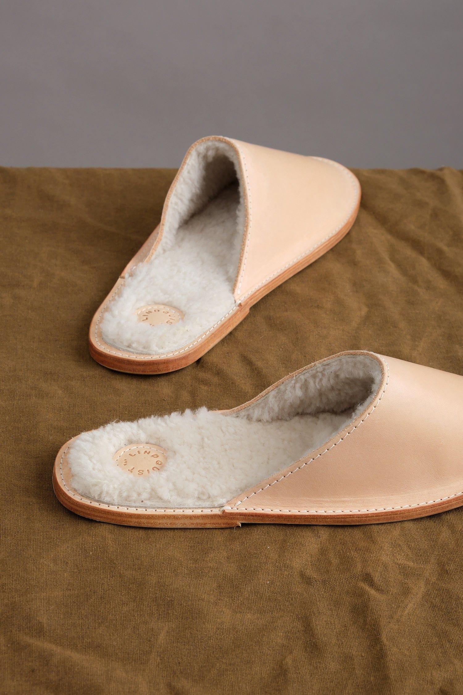 close up of shearling on Louil House Shoe in Vachetta