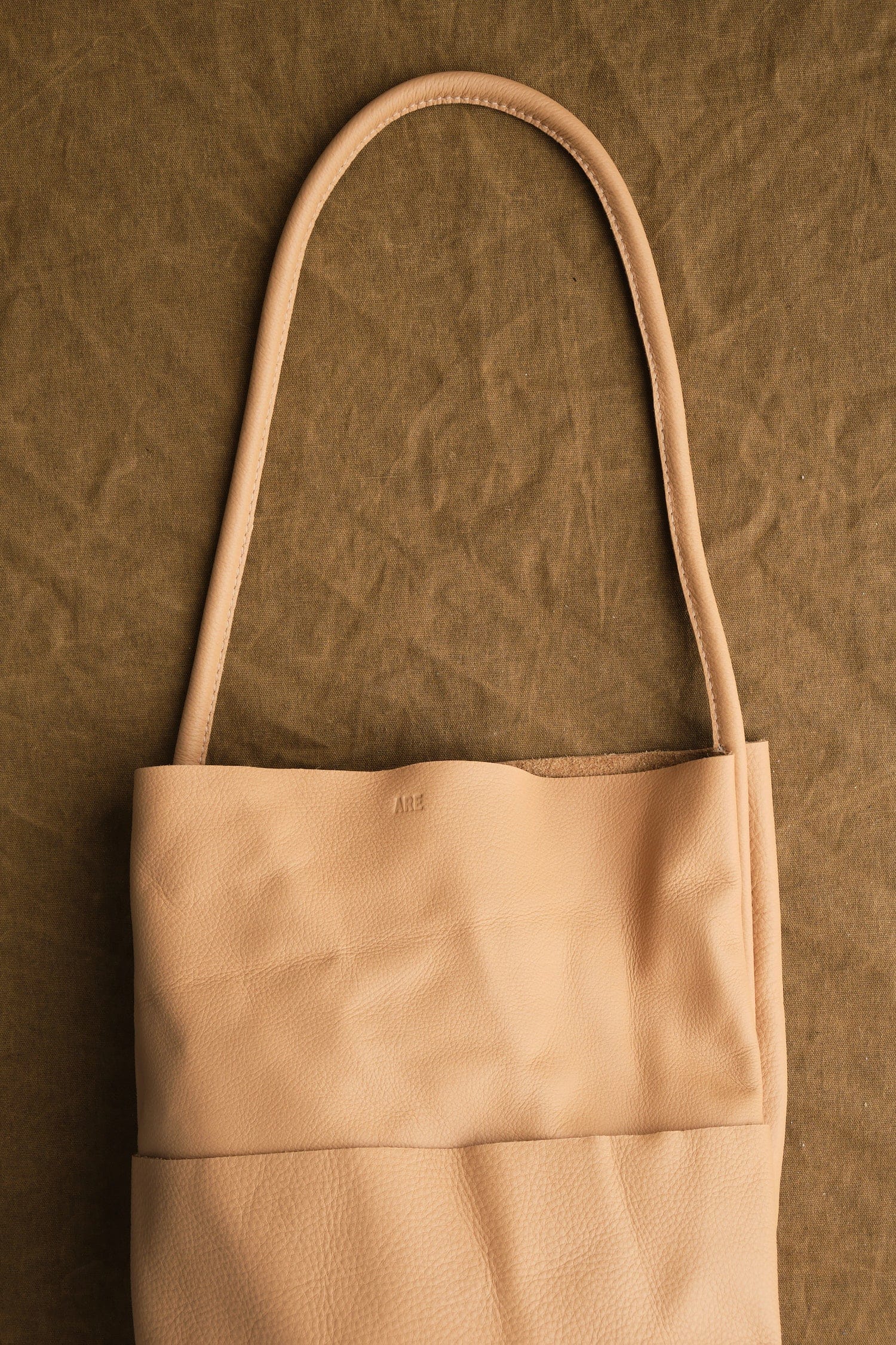 Strap on Buoy in Tan