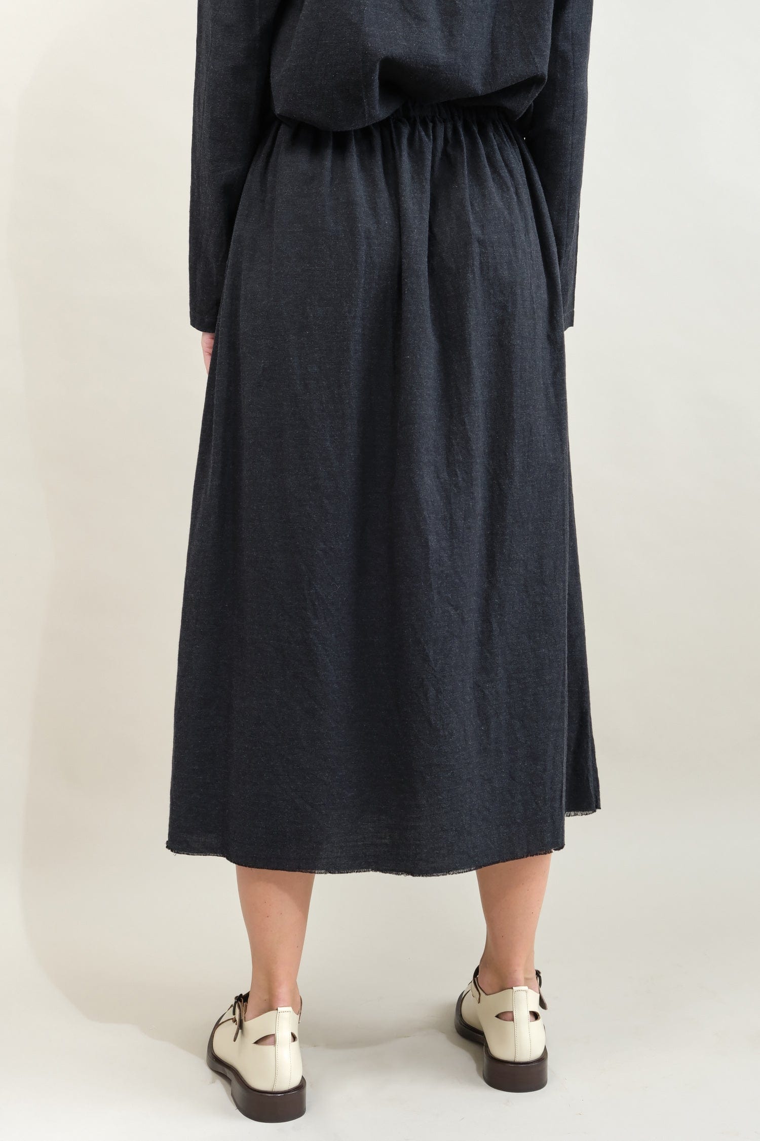 Back of Henne Skirt in Carbon