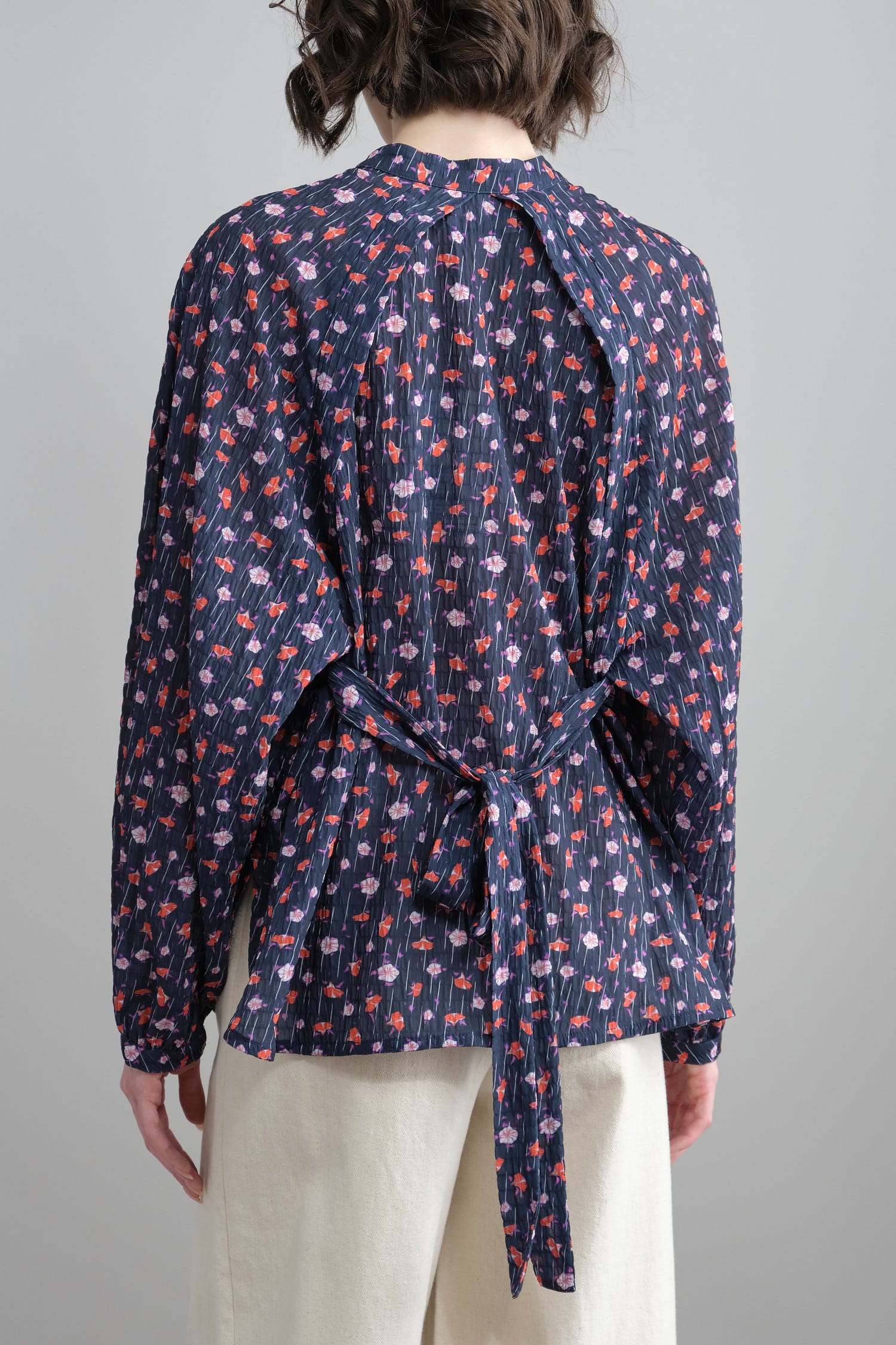 Blouse tied in back