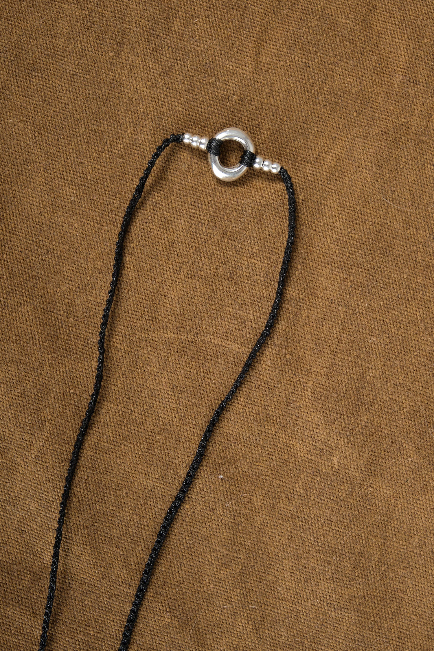 Back of Birdbone on Long Gortex Necklace