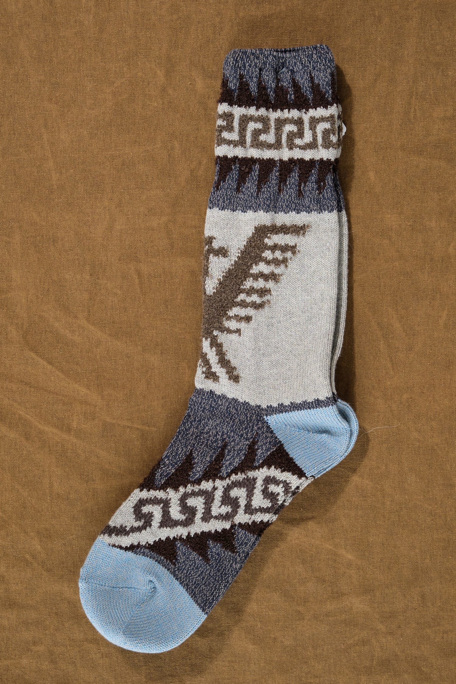 96 Yarns Cowichan Socks in Blue on table