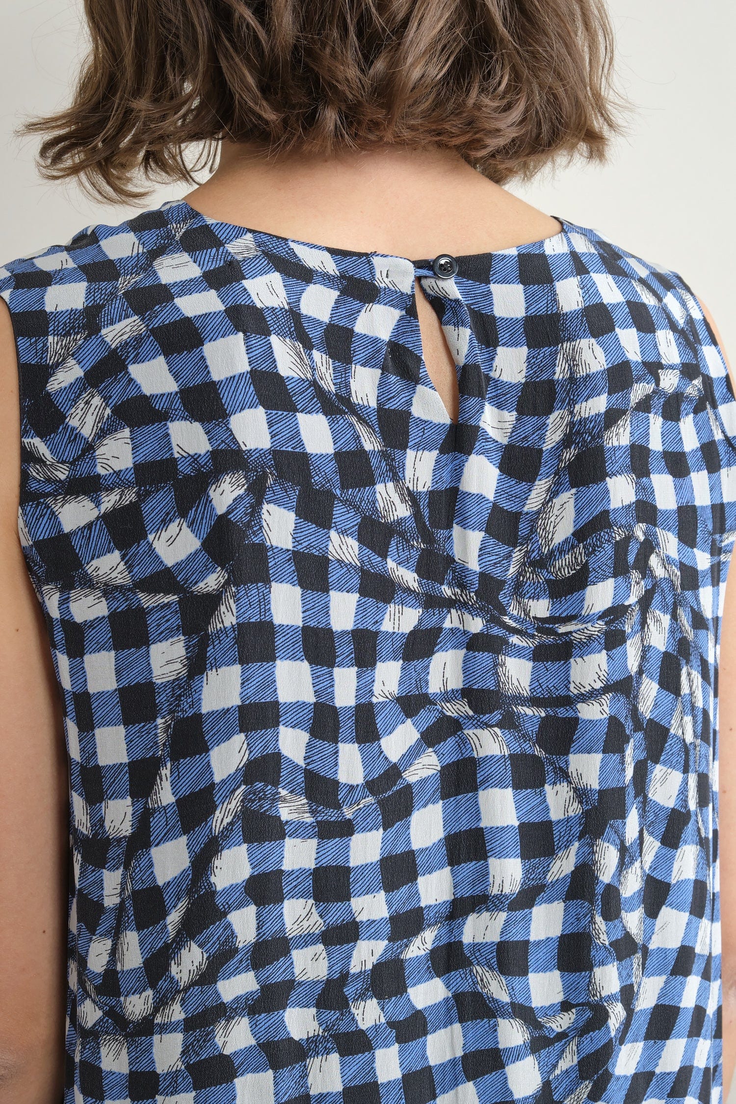 Button closure on Edith Dress in Blue