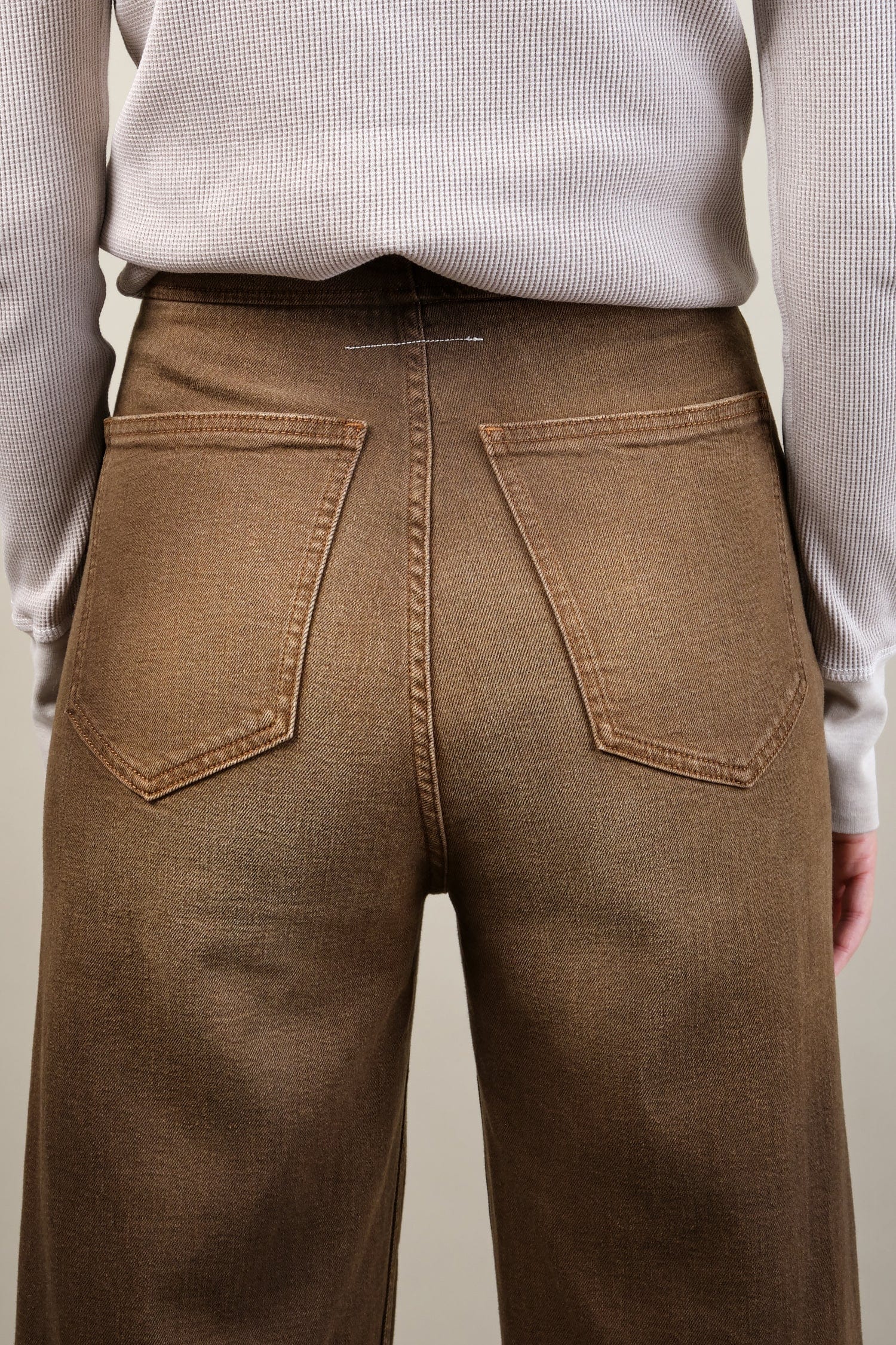 Back detailing on Carrot Jeans in Nutmeg