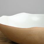 Side of Carved Eggshell Serving Bowl in Naked White