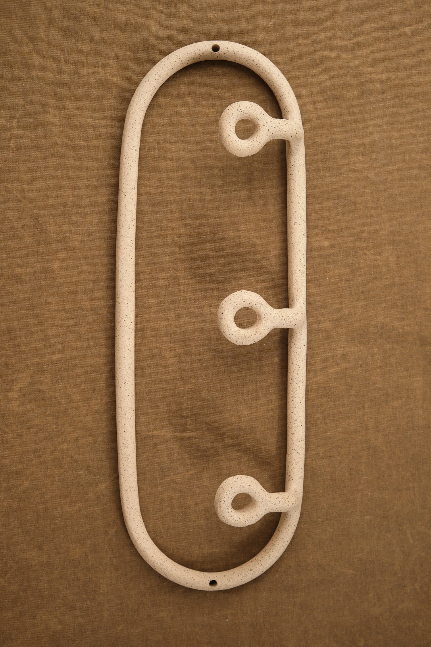 Top of Trio Coat Rack with O Hooks