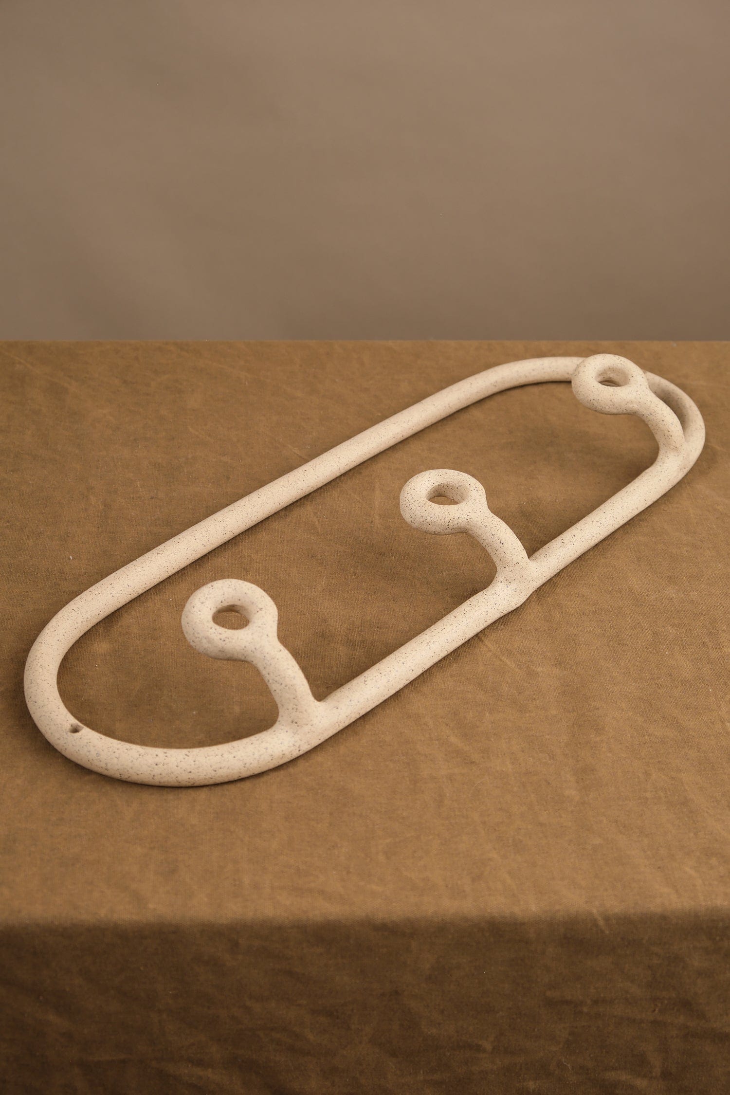 Virginia Sin Home Hooks Trio Coat Rack in Speckled Speckled / 20" L X 6.5" W X 2" H