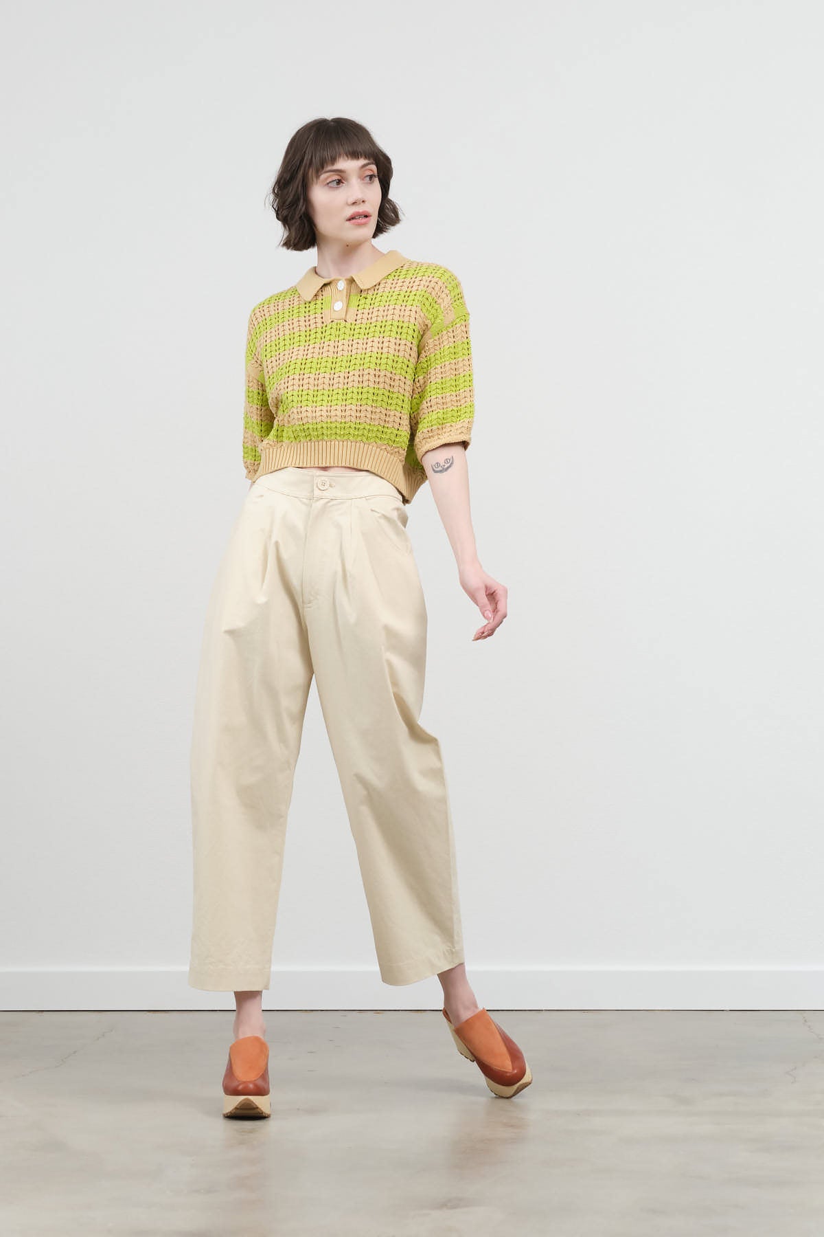 Styled view of Signature Curve Legged Trouser in Off White