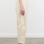 Side view of Signature Curve Legged Trouser in Off White