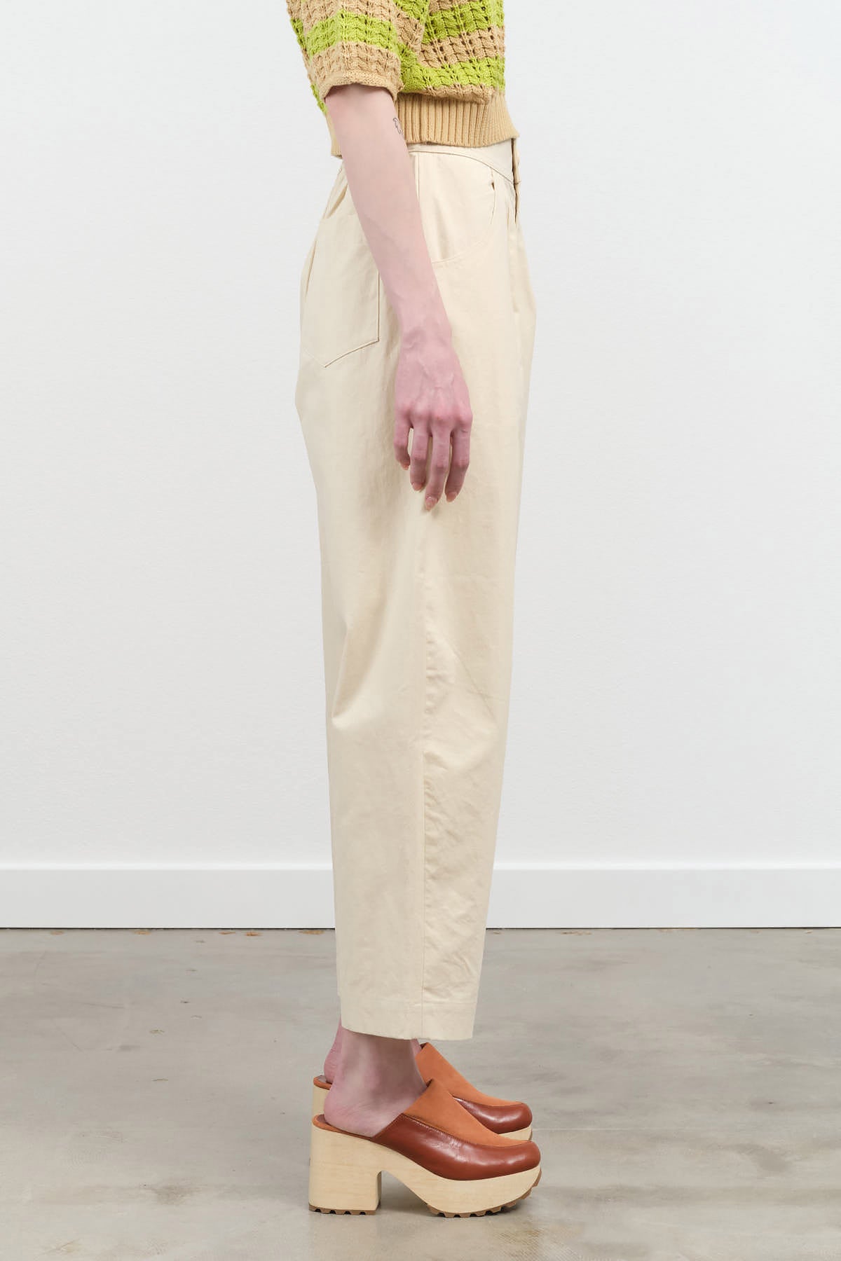 Side view of Signature Curve Legged Trouser in Off White