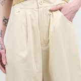 Waist view of Signature Curve Legged Trouser in Off White