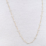 Notes Necklace by Hannah Keefe in Brass and Silver Solder