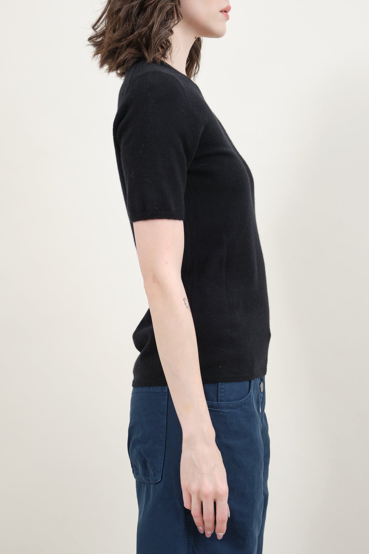Side of Short Sleeve Sweater in Black