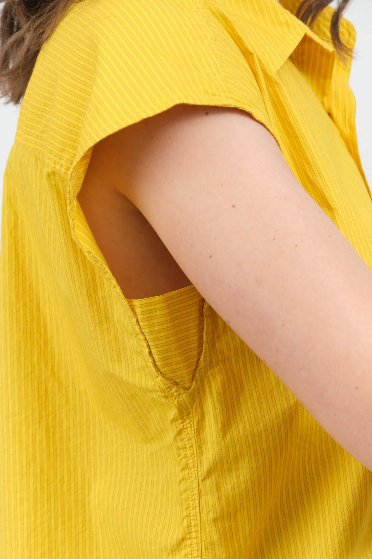Armpit view of Ruth Sleeveless Shirt in Lemon