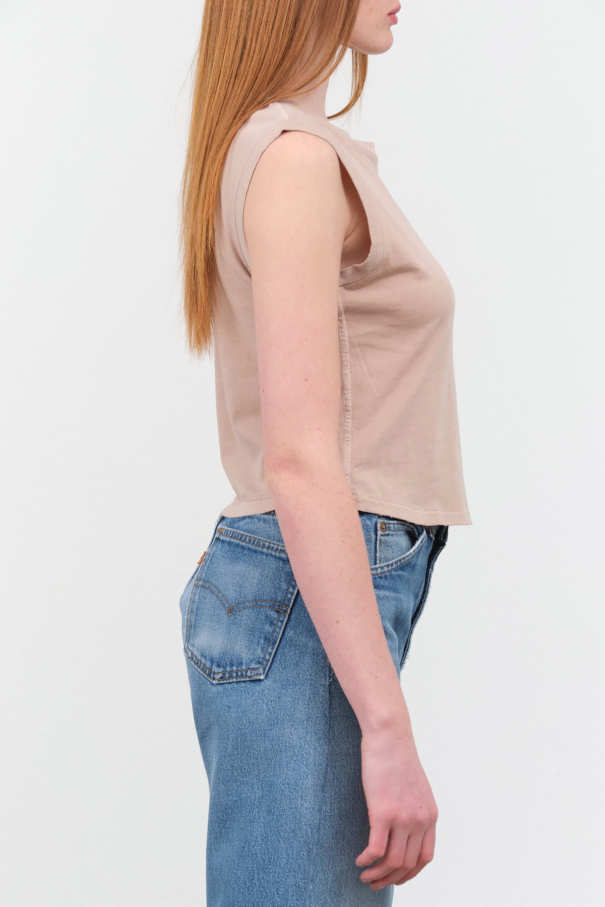 Side view of Sleeveless Babe Tee in Taupe