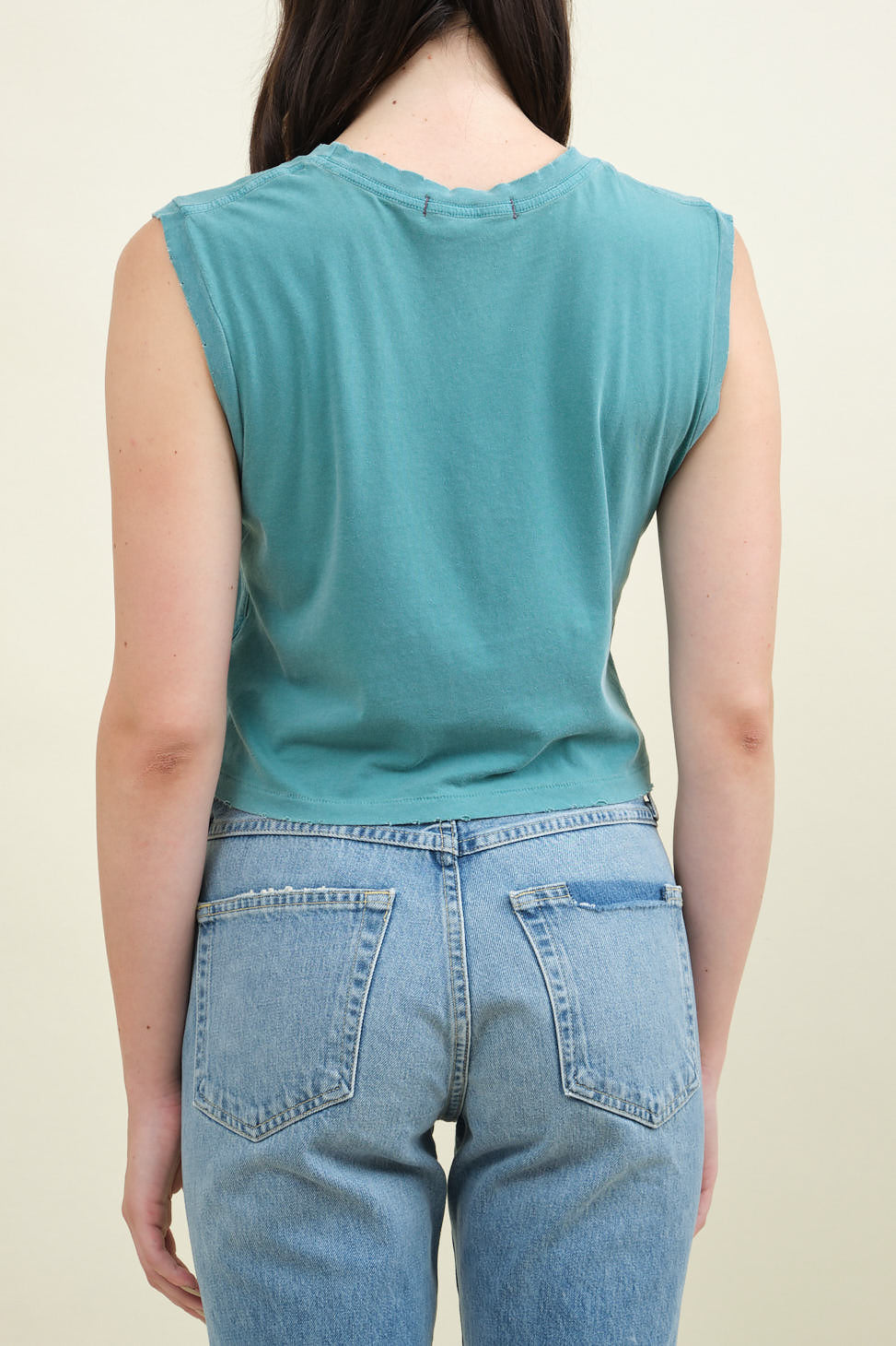 Back of Sleeveless Babe Tee in Teal