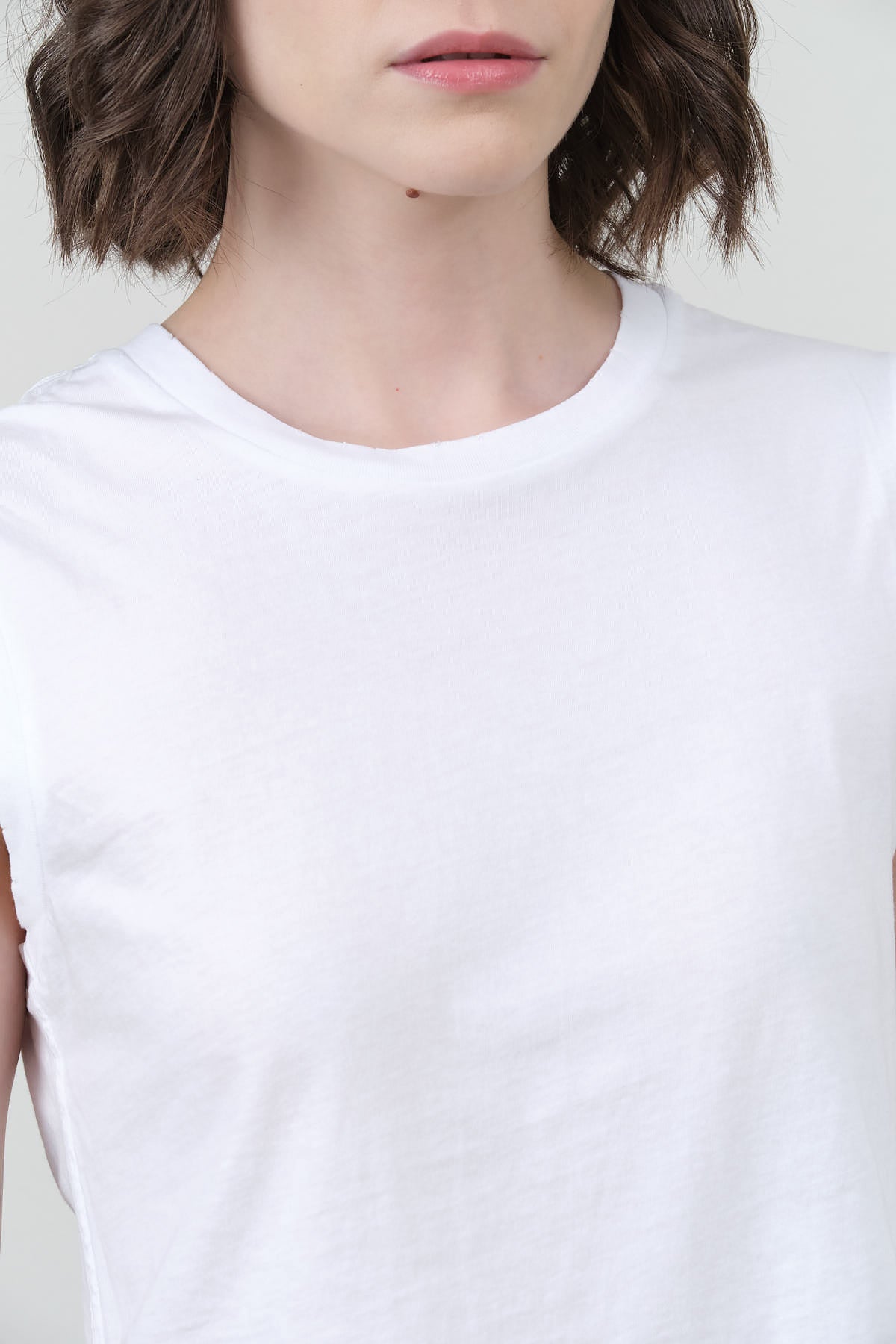 White Sleeveless Babe Tee by Amo Denim