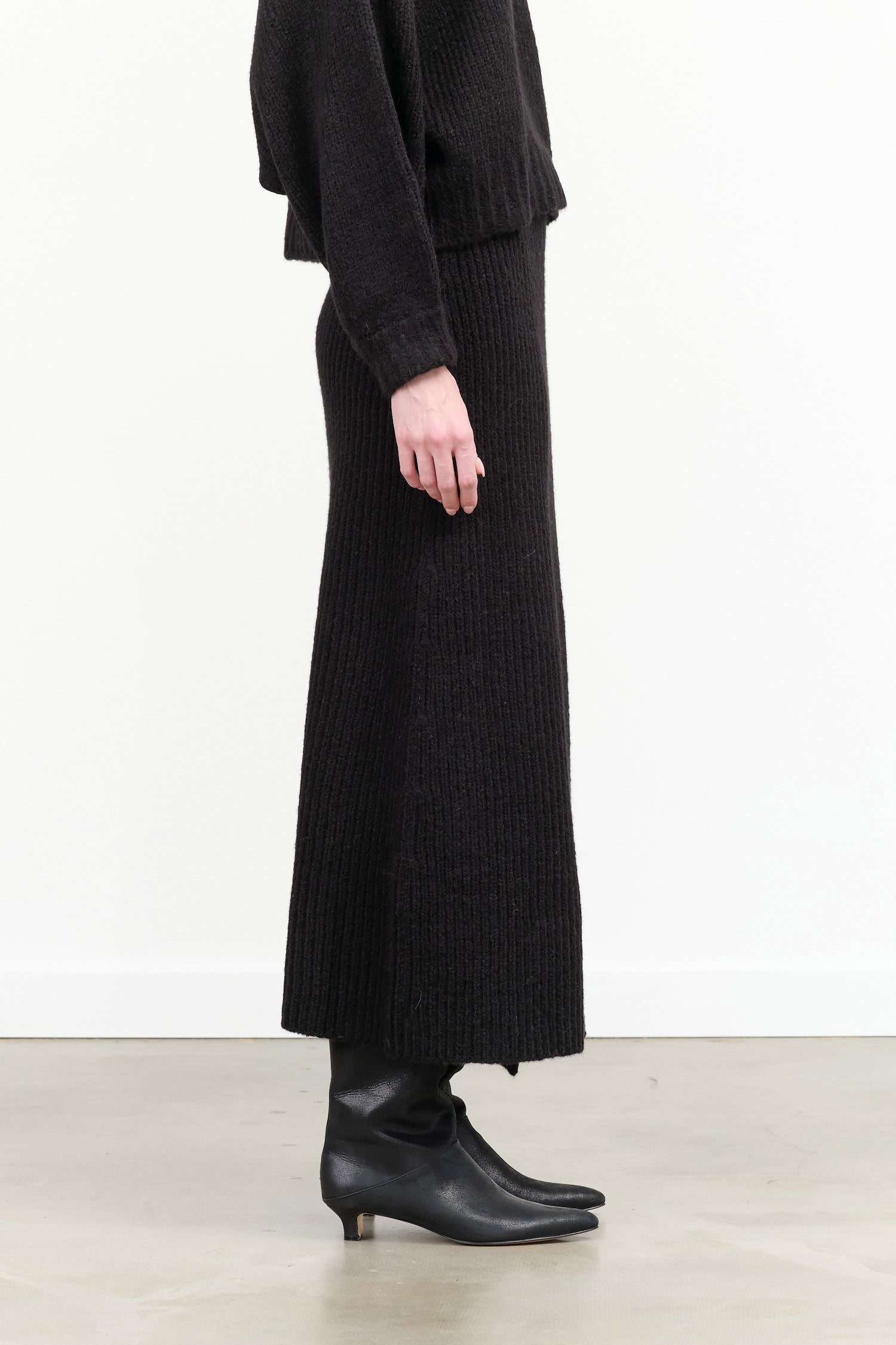 Atelier Delphine Designer Brand Noella Long Knit Maxi Skirt with False Front Wrap in Black