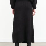 Noella Long Knit Maxi Skirt with False Front Wrap in Black by Atelier Delphine Designer Brand