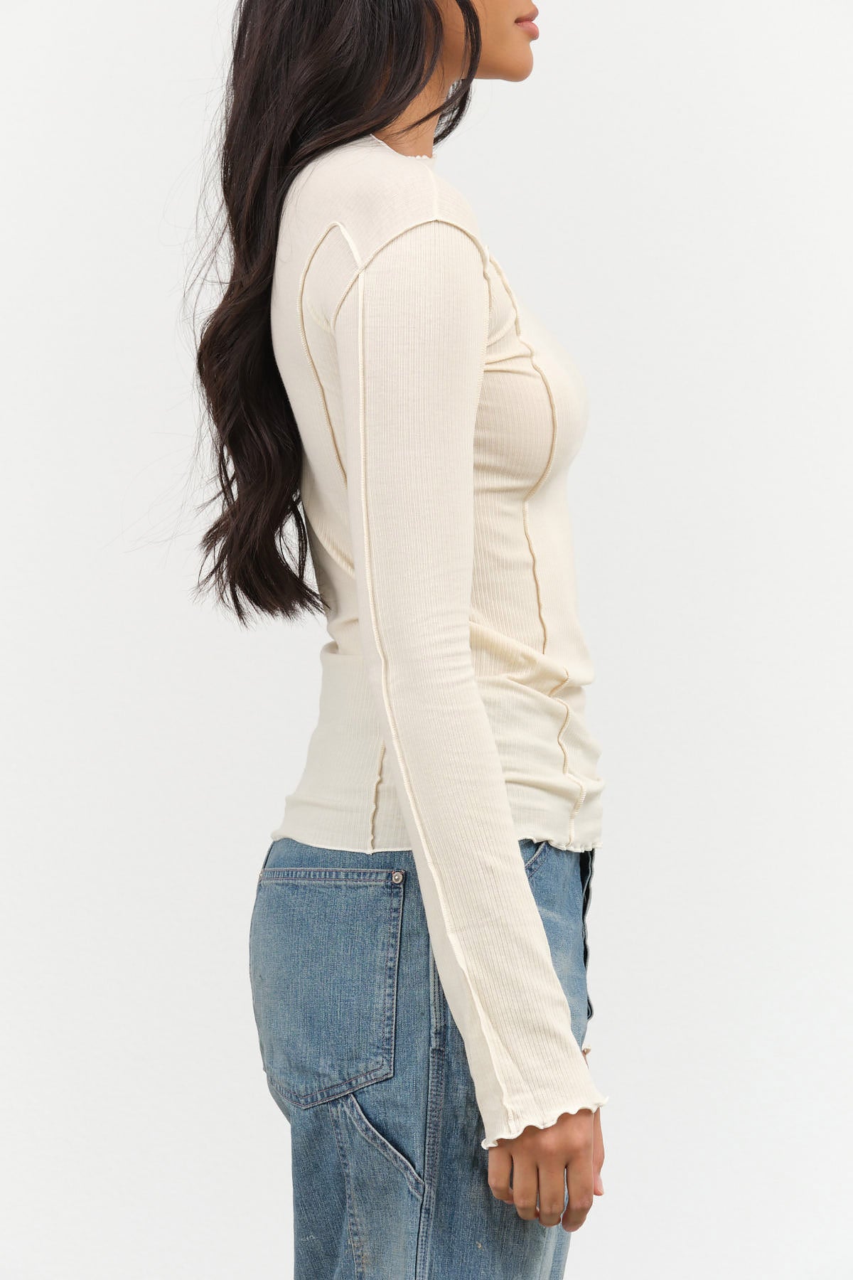 Baserange Designer Brand Omato Long Sleeve Fitted Top with Exposed Seams in Off White Cream 