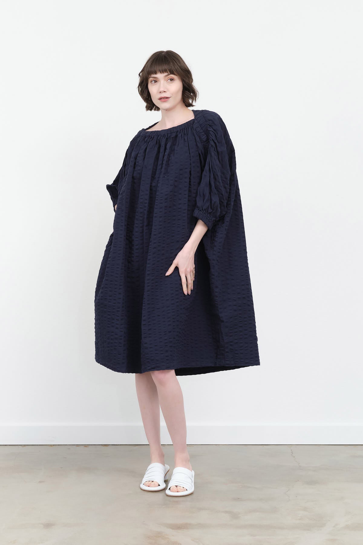 Styled view of Sack Dress in Navy