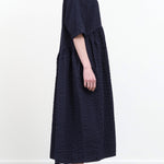 Side view of Tradi Dress in Navy
