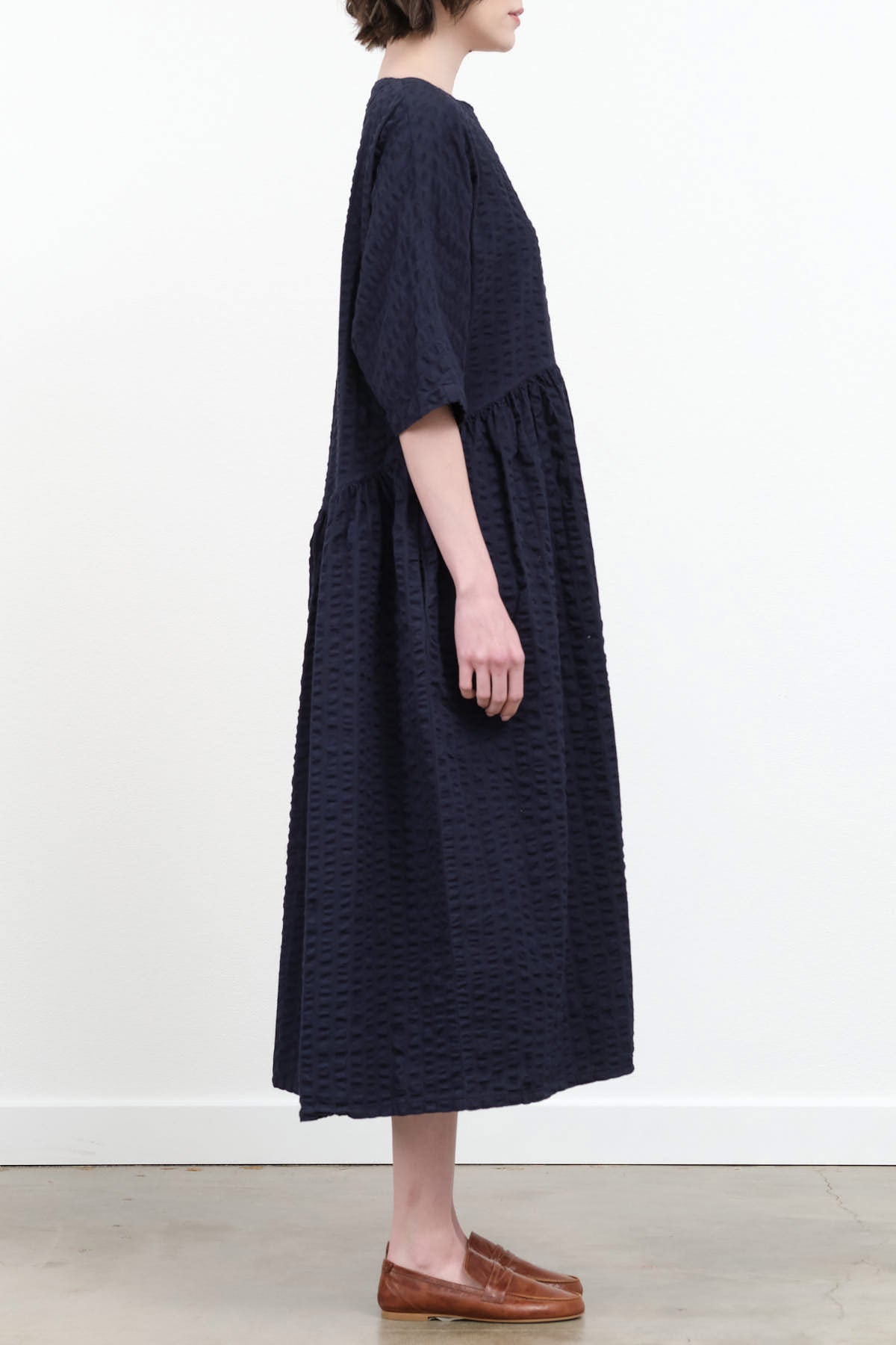 Side view of Tradi Dress in Navy