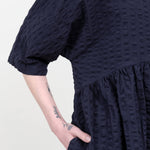 Sleeve view of Tradi Dress in Navy
