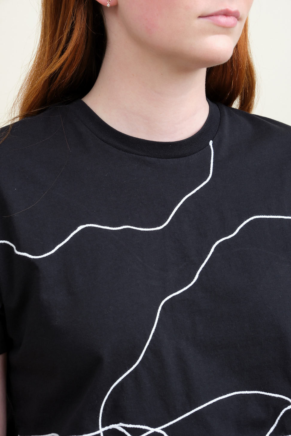Neckline on We Chaos T Shirt in Black