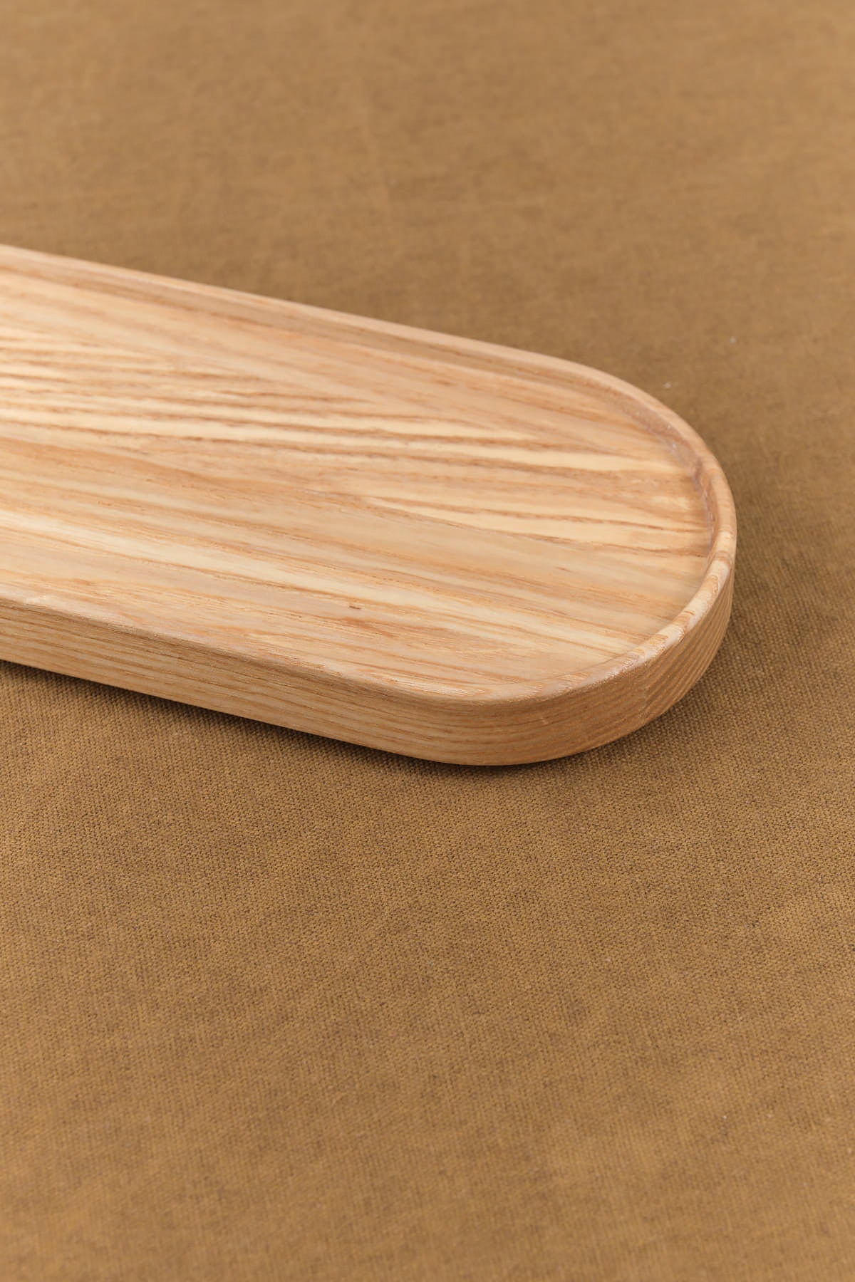 Closeup of Long Ash Wooden Oval Tray